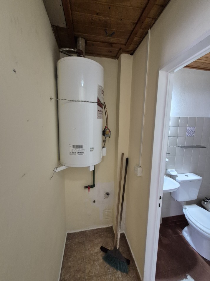Casa en esquina con quincho/cochera en Barrio 400 Viviendas