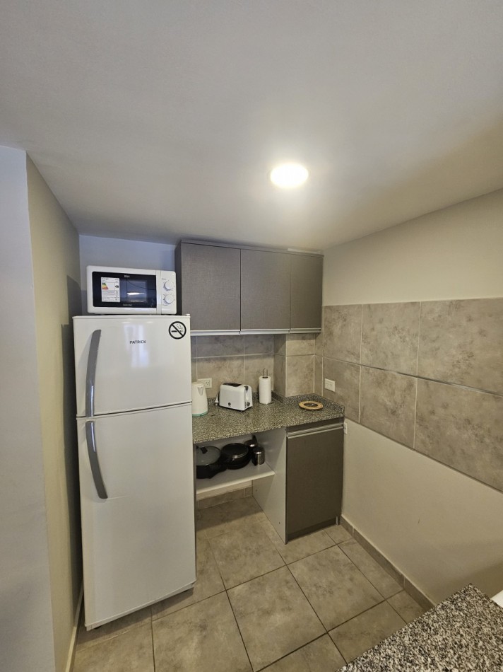 Departamento amoblado en venta, cochera cubierta incluida